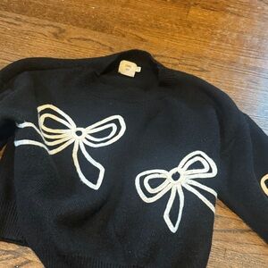 Chic Black Sweater with Bow Design
